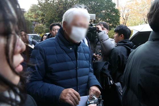 CEO of Hamilton Hotel, who is convicted of building structures illegally around the site of the Itaewon crowd crush, leaves the Seoul Western District Court in Mapo District, western Seoul, after he was handed a 8 million won ($6,200) on Wednesday. [NEWS1]