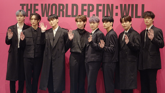 Boy band Ateez poses for photos during a press conference for its second full-length album ″The World Ep.Fin: Will″ on Friday, held at the Andaz hotel in southern Seoul. [KIM MYEONG-JI]