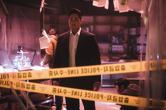 Actor Yoo Ji-tae plays Cho Heon in the Disney+ original series ″Vigilante,″ a cop who chases down Nam Joo-hyuk's character Kim Ji-yong [WALT DISNEY COMPANY KOREA]