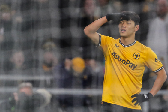 Wolverhampton Wanderers midfielder Hwang Hee-chan celebrates after scoring during a Premier League match against Burnley at the Molineux in Wolverhampton, England on Tuesday.  [AFP/YONHAP]