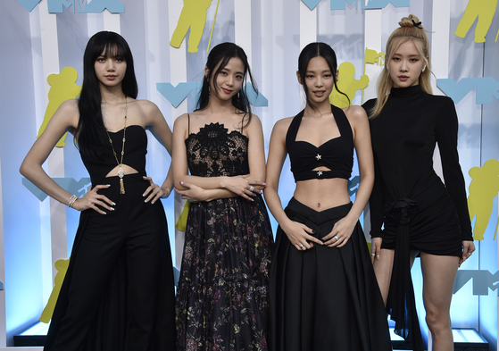 From left, Blackpink members, Lisa, Jisoo, Jennie and Rose pose for a photo at the MTV Video Music Awards at the Prudential Center on Aug. 28, 2022, in New Jersey. [AP/YONHAP]