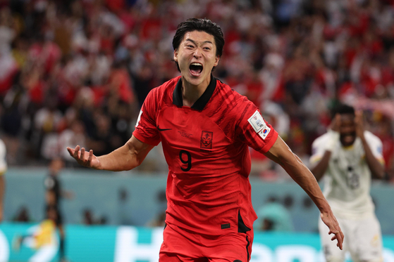 Korea's Cho Gue-sung celebrates after scoring a goal during a Group H match against Ghana at the 2022 Qatar World Cup at Education City Stadium in Doha, Qatar on Nov. 29, 2022. [NEWS1] 