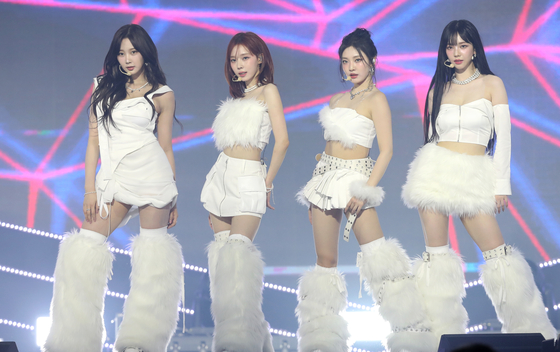 Members of girl group aespa (from left) Giselle, Winter, Ningning, and Karina perform at the ″K-Link Festival″ concert on Sunday at the Jamsil Arena in southern Seoul. [NEWS1] 