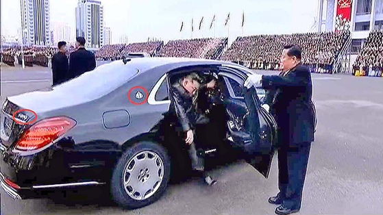North Korean leader Kim Jong-un gets out a Mercedes-Benz Maybach after arriving at the National Meeting of Mothers on Friday. [KOREAN CENTRAL TV]