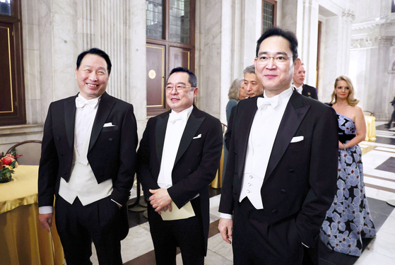From left, SK Group Chairman Chey Tae-won, Korea International Trade Association (KITA) Chairman Koo Ja-yeol and Samsung Electronics Chairman Lee Jae-yong attend a state banquet at the Royal Palace in Amsterdam on Tuesday evening during President Yoon Suk Yeol’s state visit to the Netherlands. [JOINT PRESS CORPS]