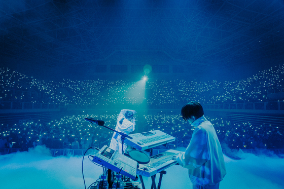 Japanese project group Yoasobi performs during the group's first concerts in Korea, held last Saturday and Sunday at the Hwajung Tiger Dome in central Seoul. [LIVET, KATO SHUMPEI]