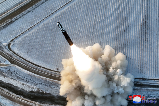 North Korea launches a Hwasong-18 solid-fuel intercontinental ballistic missile (ICBM) at an undisclosed location Monday in a photo released by the official North Korean Central News Agency (KCNA) Tuesday. The KCNA reported that the ICBM flew 1,002.3 kilometers for 4,415 seconds at a maximum altitude of 6,518.2 kilometers before landing in the East Sea. [YONHAP]