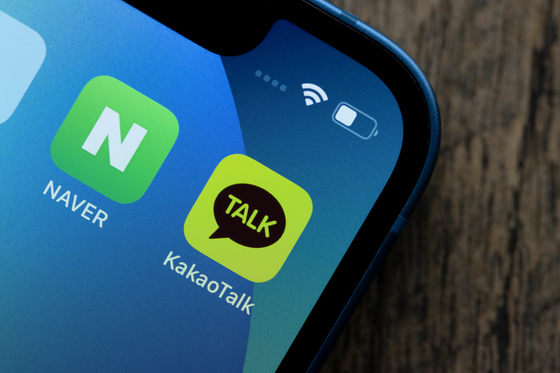 KakaoTalk and Naver app icons are seen on an iPhone. [SHUTTERSTOCK]
