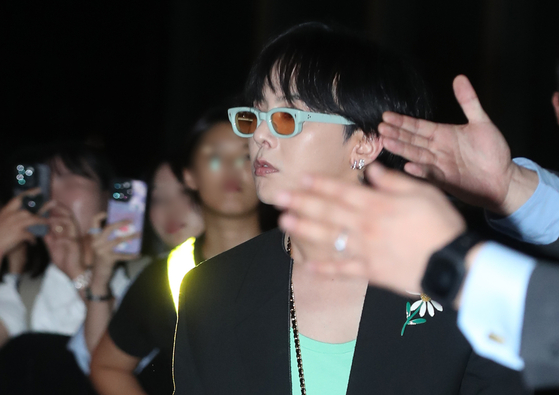 G-Dragon of boy band Big Bang at Coex, southern Seoul, attends an event for his sister's fashion brand WE11DONE on Sept. 7. [NEWS1]