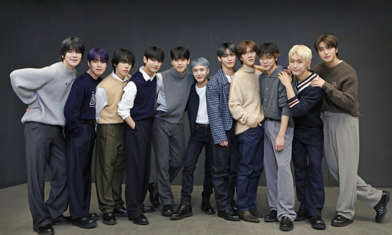 Members of boy band Omega X pose for photos after an interview with the Korea JoongAng Daily at the JTBC headquarters in Sangam-dong, western Seoul, on Nov. 3. [PARK SANG-MOON]