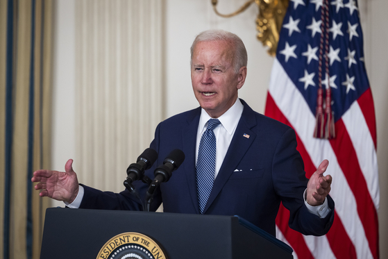 U.S. President Joe Biden speaks before signing the Inflation Reduction Act in the White House in August 2022. [EPA/YONHAP]