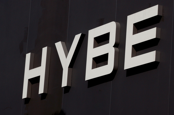 K-pop agency HYBE revealed the legal measures being taken against perpetrators of malicious activities toward 10 of its labels’ artists. [YONHAP]