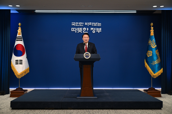 President Yoon Suk Yeol delivers his New Year's message at the president's office in Yongsan on Monday. [PRESIDENTIAL OFFICE]