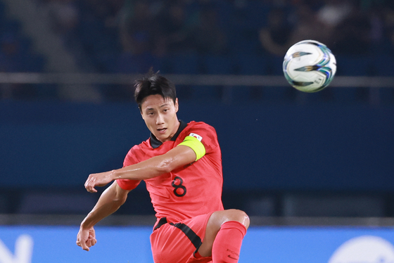Korea's Paik Seung-ho kicks the ball during a game against Kyrgyzstan in the Round of 16 of the men's football tournament at Jinhua Sports Center Stadium in Zhejiang Province, China on Sept. 27, 2023.  [YONHAP]