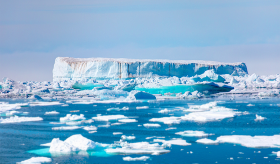 Melting icebergs by the coast of Greenland [SHUTTERSTOCK]