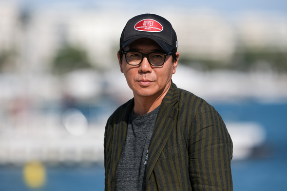 Director Kim Jee-woon poses for a photo at the 2023 Cannes Film Festival held at Cannes, France, in May. Kim's film ″Cobweb″ was invited to the non-competitive section of the 76th Cannes Film Festival. [BARUNSON E&A]