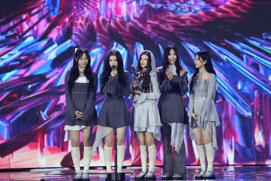 Girl group NewJeans gives a speech after winning the Grand Prize of the Digital Song of the Year award at the 38th Golden Disc Awards on Saturday at the Jakarta International Stadium (JIS), Indonesia [GOLDEN DISC AWARDS ORGANIZING COMMITTEE]