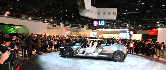 Visitors to CES 2024 take photos of LG Electronics’ Alpha-able concept car in Las Vegas. The trade show runs until Friday. [NEWS1] 