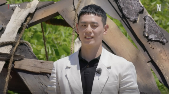 Professional basketball player Lee Gwan-hee, one of the single men and women appearing on the third season of ″Single's Inferno,″ in a scene in the first episode [NETFLIX]
