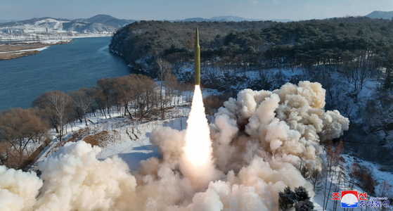 In this photo released on Monday by Pyongyang's state-controlled Korean Central News Agency, North Korea launches a solid-fuel intermediate-range ballistic missile the previous day. [YONHAP]
