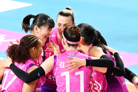 The Heungkuk Life Insurance Pink Spiders celebrate during a V League game against Gimcheon Korea Expressway Hi-Pass at Gimcheon Gymnasium in Gimcheon, North Gyeongsang on Friday. [KOVO] 