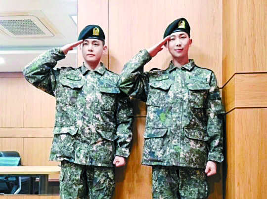 BTS's V and RM pose for a photo after finishing their basic training. The photo was shared on RM's Instagram on Tuesday. [SCREEN CAPTURE]