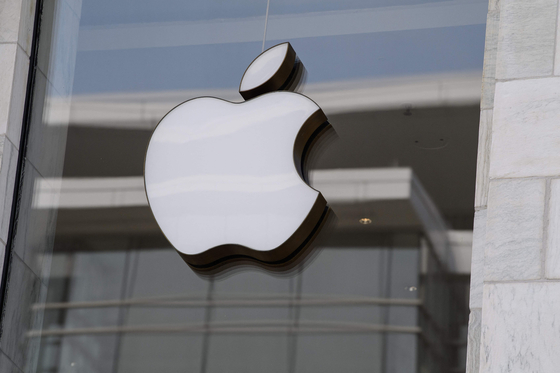 The Apple logo at the entrance to an Apple store in Washington, D.C., on September 14, 2021 [AFP]