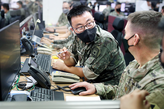In this file photo dated Aug. 22, 2022, members of the ROK-U.S. Combined Forces Command, U.S. Forces Korea, UN Command and other subordinate commands engage with each other during the joint Ulchi Freedom Shield exercise. [MINISTRY OF NATIONAL DEFENSE]