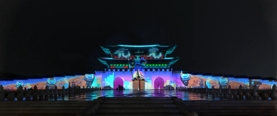 Multimedia artist Lee Lee-nam’s “Gwanghwa Sansudo″ is projected onto the front gates of Gyeongbok Palace in central Seoul as part of 2023 Seoul Light Gwanghwamun. [CULTURAL HERITAGE ADMINISTRATION]