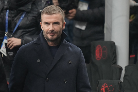 David Beckham arrives to attend a Champions League match between AC Milan and Paris Saint-Germain at the San Siro stadium in Milan, Italy on Nov. 7, 2023.  [AP/YONHAP]