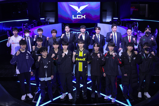 Players and coaches of Esports teams pose for a photo at the 2024 LCK Spring Opening Media Day at LoL Park in central Seoul on Jan. 10. [NEWS1] 
