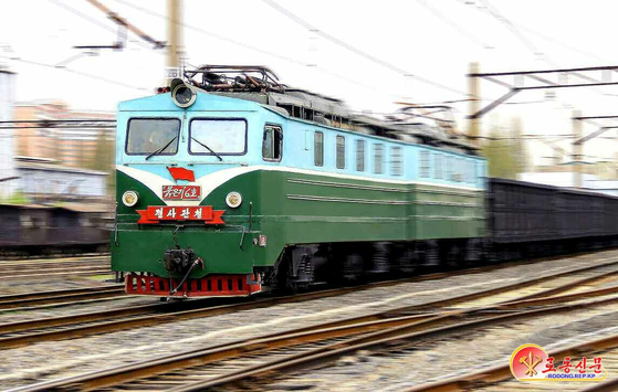 A photo of a North Korean train released by the North's official Rodong Sinmun on Jan. 16. [YONHAP]