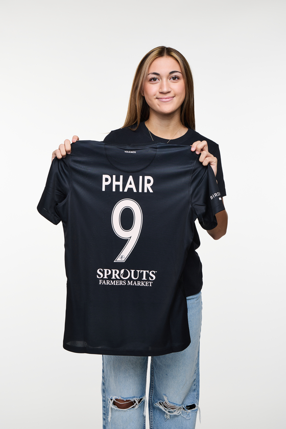 Casey Phair poses with her Angel City FC shirt in a photo released by the club Thursday.  [ANGEL CITY]