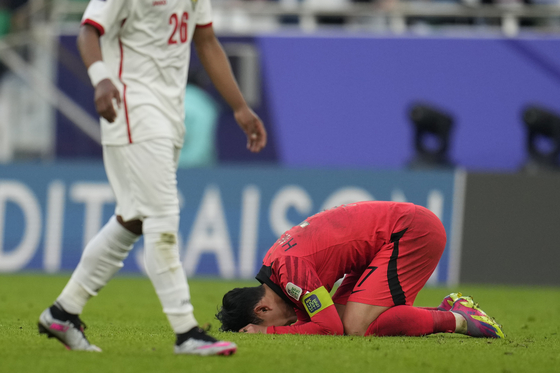 Korea's Son Heung-min reacts after an Asian Cup Group E match between Jordan and Korea at Al Thumama in Doha, Qatar on Saturday.  [AP/YONHAP]