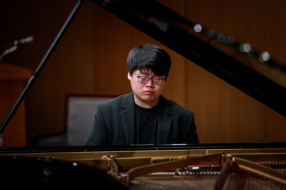 Pianist Kim Jun-hyung is Kumho Art Hall's residential artist this year. [KUMHO ART HALL]