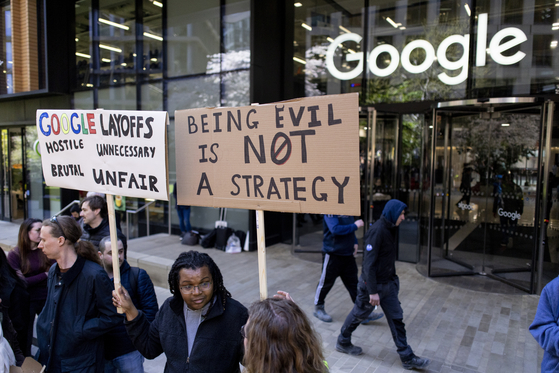 Google staff protest against the treatment of employees and the global layoffs affecting around 10,000 workers, outside Google HQ on April 4, 2023. [EPA]
