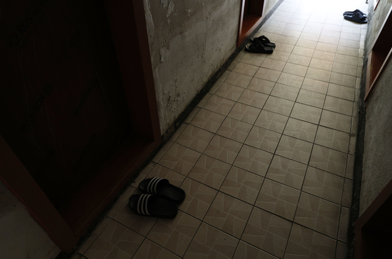 Pairs of shoes placed at a residence in a low-income neighborhood in Yeongdeungpo District, western Seoul, on May 18, 2023 [YONHAP]