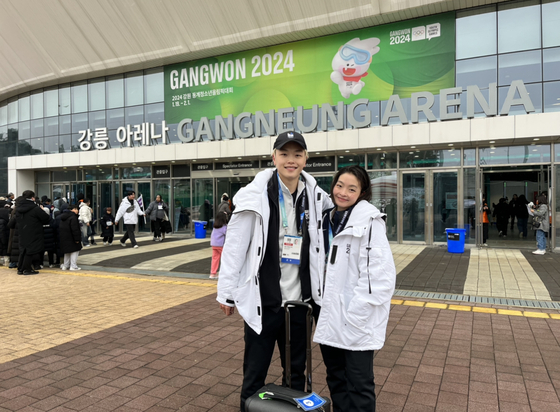 Alex Shibutani, left, and Maia Shibutani pose for a photo outside of the Gangneung Ice Arena before the figure skating team event at the Gangwon 2024 Winter Youth Olympics in Gangneung, Gangwon on Thursday. [MARY YANG]
