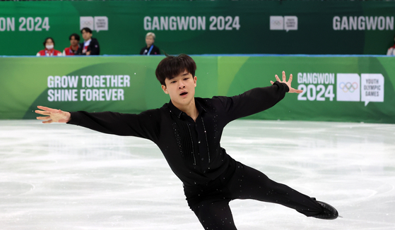 Kim Hyun-gyeom performs in the men's single skate in the figure skating team event at the Gangwon 2024 Winter Youth Olympics at Gangneung Ice Arena in Gangneung, Gangwon on Thursday. [YONHAP]