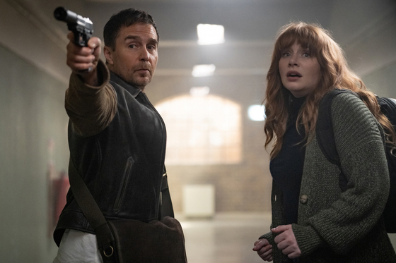 A scene from ″Argylle,″ an upcoming spy action film from director Mattew Vaughn starring Sam Rockwell, left, and Bryce Dallas Howard [UNIVERSAL PICTURES]