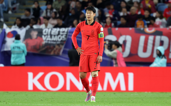 Son Heung-min reacts after Australia scores the opening goal of an Asian Cup quarterfinal match between Korea and Australia in Qatar on Friday.  [NEWS1]