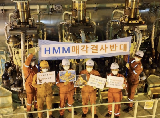 Unionized members of HMM picket on a vessel to protest Harim Group's plan to acquire the shipping company. [HMM LABOR UNION]