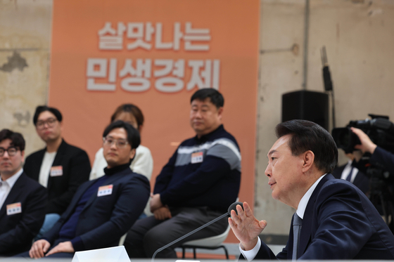 President Yoon Suk Yeol speaks at the town hall meeting in Seongdong District, eastern Seoul, on Thursday. [PRESIDENTIAL OFFICE] 