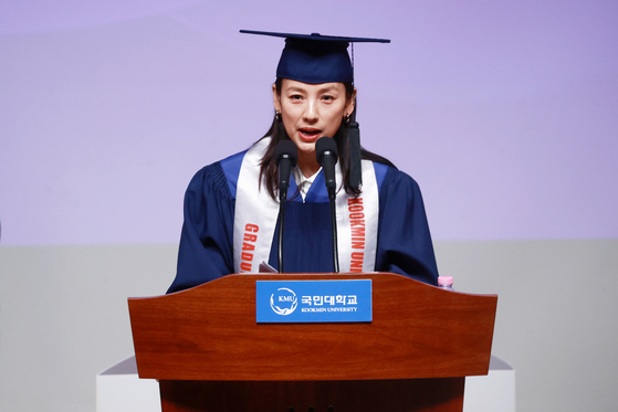 Singer Lee Hyo-ri gives a commencement speech to the graduating class of 2023 at Kookmin University, her alma mater, on Wednesday. “Just go and follow your heart,” the singer said to the graduates, saying she will “always be giving [her] warmest support.” She then ended the speech with a performance of her song “Chitty Chitty Bang Bang” (2010). Lee graduated from the university’s School of Performing Arts in 2006. She debuted as a member of girl group Fin.K.L in 1998 and launched her solo career in 2003, and is best known for hit songs “10 Minutes" (2003), "U-Go-Girl" (2008) and "Bad Girls" (2013). [YONHAP]