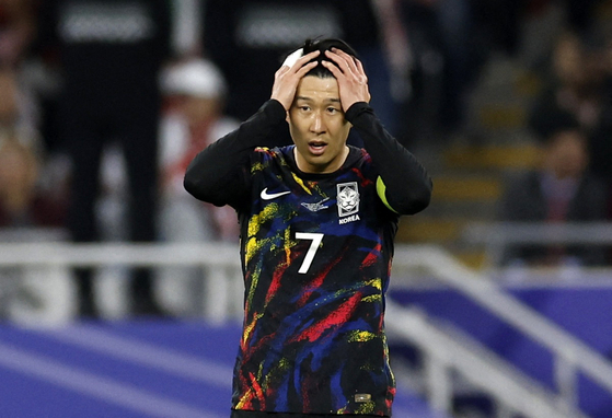Son Heung-min reacts after Korea was eliminated from the Asian Cup by Jordan in Qatar on Feb. 6.  [REUTERS/YONHAP]