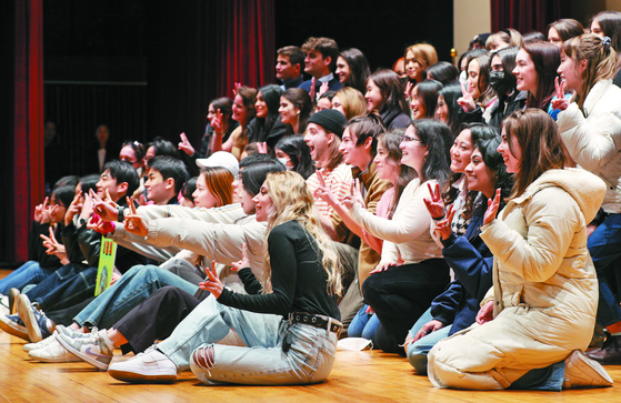 International students pose for a photo during an orientation session held at Korea University last February [NEWS1]