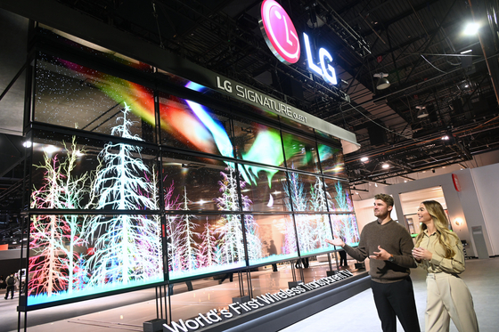 LG Electronics presents a media art made of 15 LG Signature OLED T panels at its booth at the CES 2024 in Las Vegas in January. [LG ELECTRONICS]