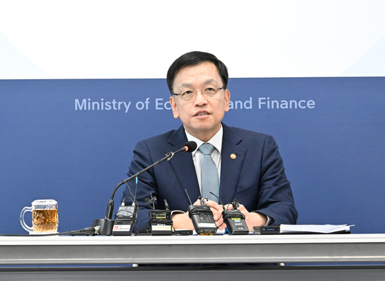 Finance Minister Choi Sang-mok speaks at a press conference at the government complex in Sejong on Friday. [MINISTRY OF ECONOMY AND FINANCE]