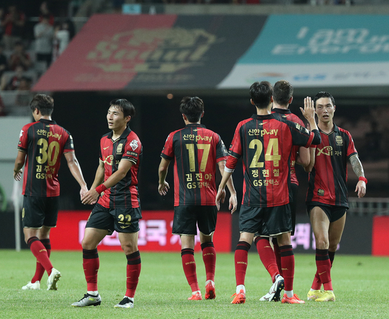 FC Seoul players celebrate after winning a K League 1 match against Suwon FC at Seoul World Cup Stadium in western Seoul on July 12, 2023. [NEWS1] 