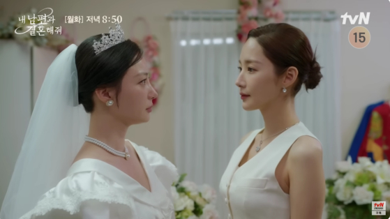 Park Min-young, right, and her co-star Song Ha-yoon in a scene of "Marry My Husband" [TVN]